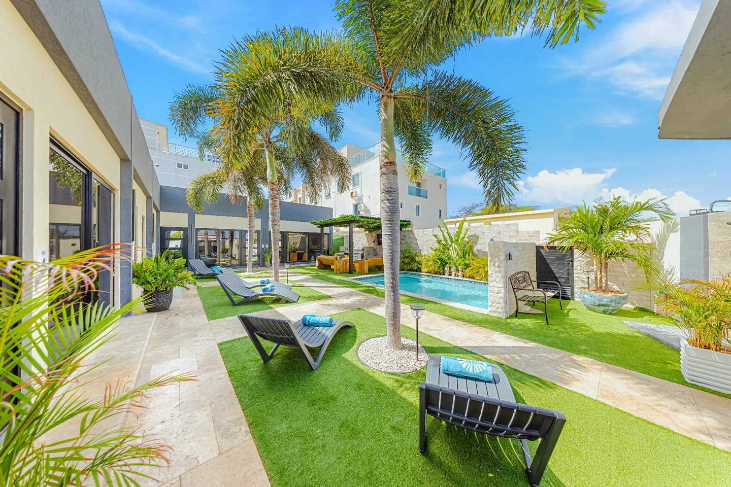 Full Sea La Vie Suites building surrounding tropical pool