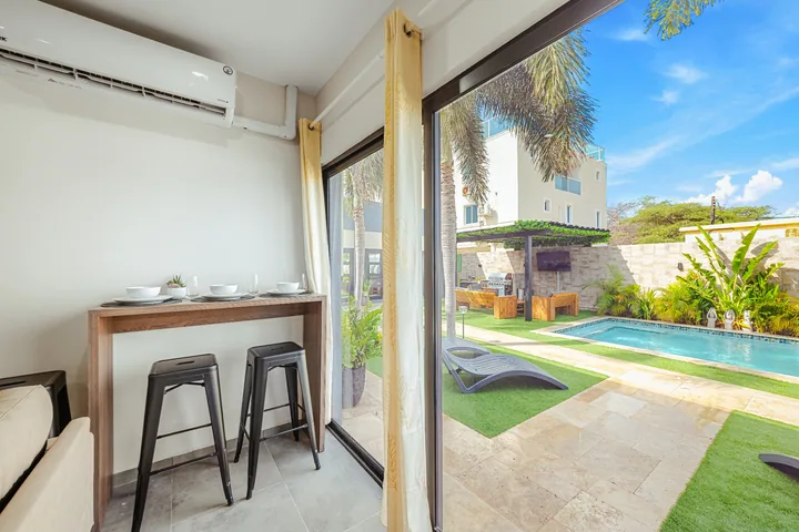 Pool visible through patio windows