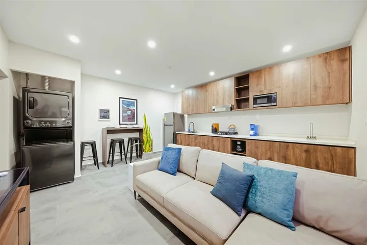 Modern kitchen and seating in Sea La Vie Suite 5
